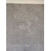 Relief, winged man holding solar discs
